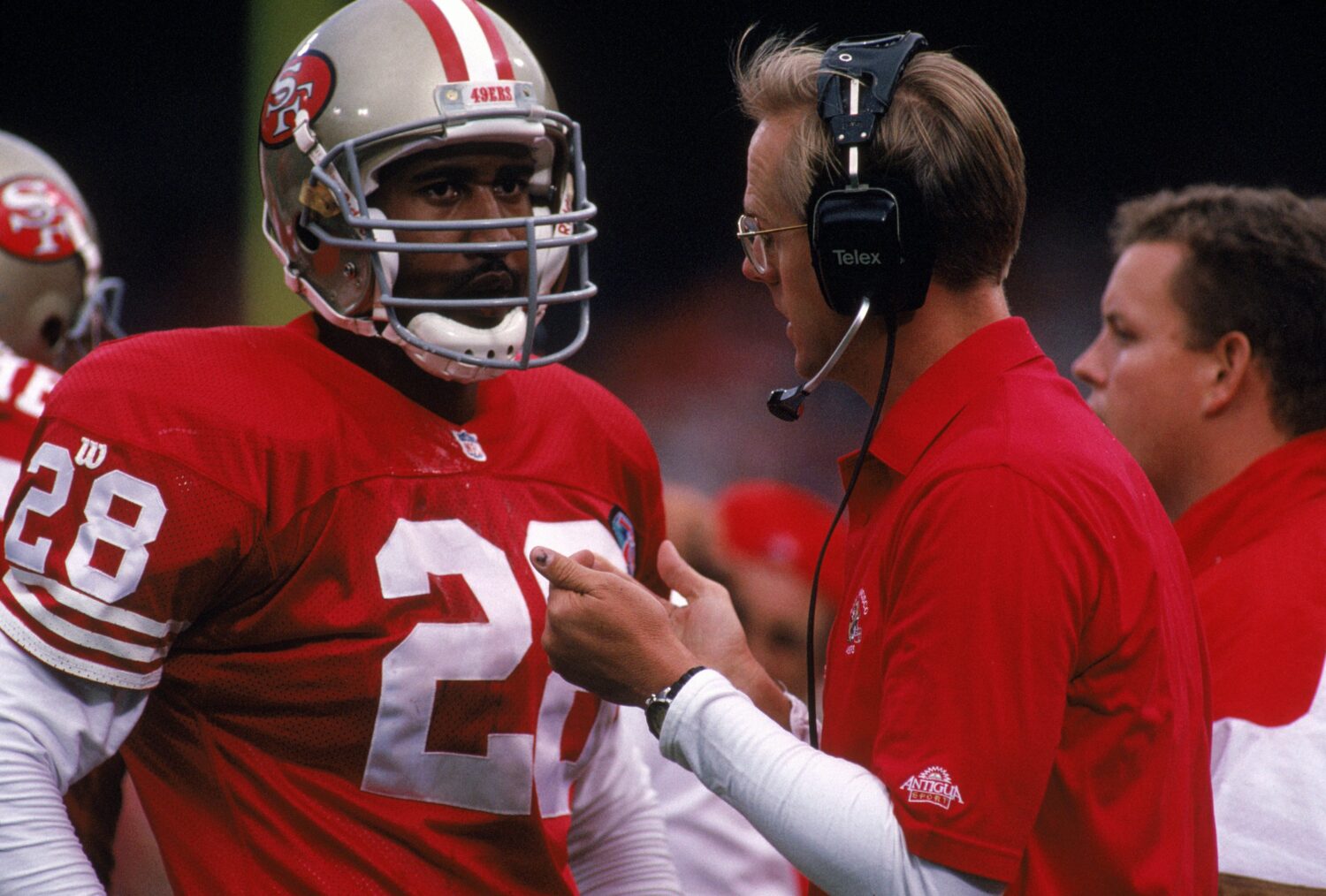 SAN FRANCISCO - AUGUST 26: Dana Hall #28 of the San Francisco 49ers listens to a member of the 49er...