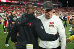 SANTA CLARA, CALIFORNIA - OCTOBER 19: Head coach Raheem Morris of the Atlanta Falcons and head coach Kyle Shanahan of the San Francisco 49ers embrace following the game at Levi's Stadium on October 19, 2025 in Santa Clara, California. (Photo by Ezra Shaw/Getty Images)