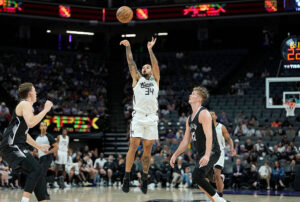 SACRAMENTO, CALIFORNIA - JULY 04: Emanuel Sharp #34 of the Sacramento Kings shoots a three-point shot against the Brooklyn Nets during the second half in the California Classic a NBA Summer League game at Golden 1 Center on July 04, 2026 in Sacramento, California. NOTE TO USER: User expressly acknowledges and agrees that, by downloading and or using this photograph, User is consenting to the terms and conditions of the Getty Images License Agreement. (Photo by Thearon W. Henderson/Getty Images)