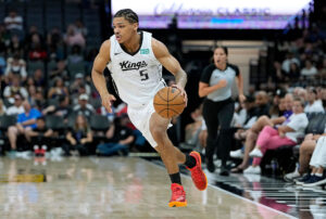 SACRAMENTO, CALIFORNIA - JULY 04: Darius Acuff Jr. #5 of the Sacramento Kings dribbling the ball looks to drive to the basket against the Brooklyn Nets during the second half in the California Classic a NBA Summer League game at Golden 1 Center on July 04, 2026 in Sacramento, California. NOTE TO USER: User expressly acknowledges and agrees that, by downloading and or using this photograph, User is consenting to the terms and conditions of the Getty Images License Agreement. (Photo by Thearon W. Henderson/Getty Images)