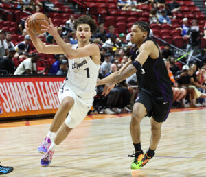 LAS VEGAS, NEVADA - JULY 09: Keaton Wagler #1 of the LA Clippers drives against Darius Acuff Jr. #5 of the Sacramento Kings in the second half of a 2026 NBA Summer League game at the Thomas & Mack Center on July 09, 2026 in Las Vegas, Nevada. NOTE TO USER: User expressly acknowledges and agrees that, by downloading and or using this photograph, User is consenting to the terms and conditions of the Getty Images License Agreement. (Photo by Ethan Miller/Getty Images)