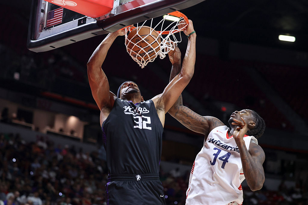 LAS VEGAS, NEVADA - JULY 12: Dylan Cardwell #32 of the Sacramento Kings dunks against Felix Okpara ...