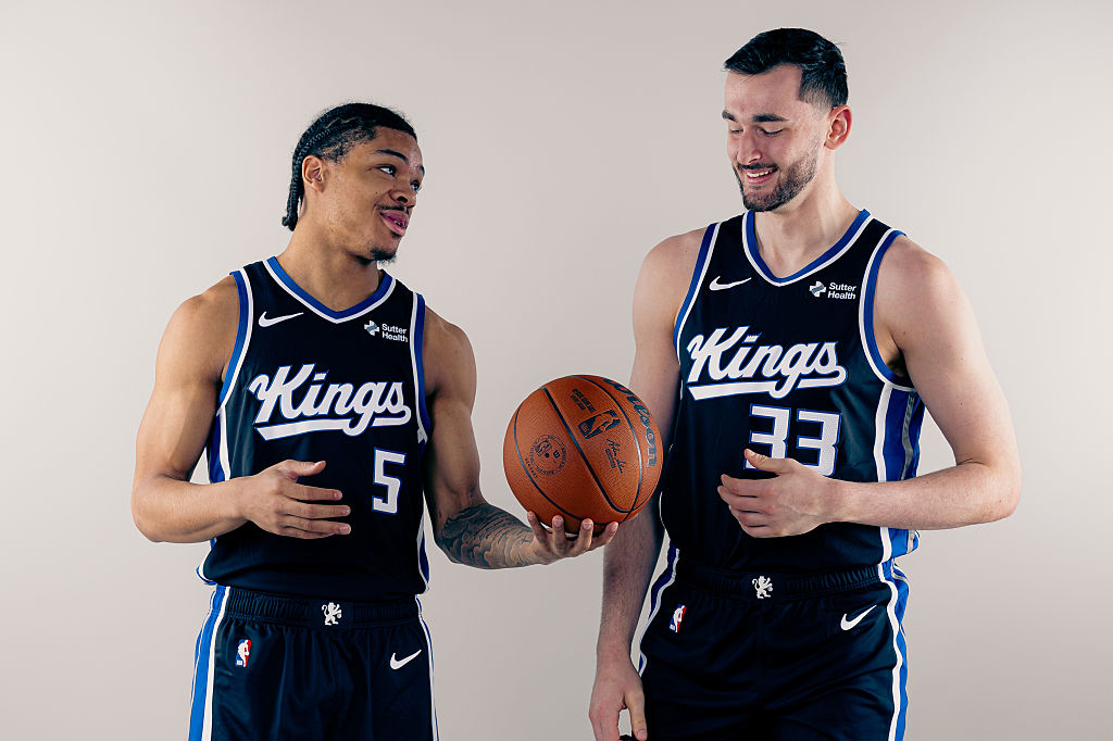 LAS VEGAS, NEVADA - JULY 15: Darius Acuff Jr. #5 and Alex Karaban #33 of the Sacramento Kings pose ...