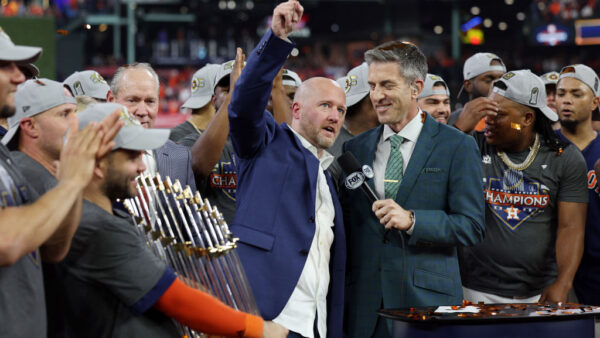 HOUSTON, TEXAS - NOVEMBER 05: General Manager James Click of the Houston Astros speaks with Kevin Burkhardt following a 4-1 victory in Game Six of the 2022 World Series at Minute Maid Park on November 05, 2022 in Houston, Texas. (Photo by Harry How/Getty Images)