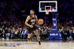 PHILADELPHIA, PENNSYLVANIA - MARCH 23: Cameron Payne #20 of the Philadelphia 76ers dribbles the ball during a game against the Oklahoma City Thunder at Xfinity Mobile Arena on March 23, 2026 in Philadelphia, Pennsylvania. NOTE TO USER: User expressly acknowledges and agrees that, by downloading and or using this photograph, User is consenting to the terms and conditions of the Getty Images License Agreement. (Photo by Emilee Chinn/Getty Images)