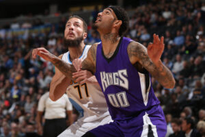 DENVER, CO - FEBRUARY 23: Joffrey Lauvergne #77 of the Denver Nuggets and Willie Cauley-Stein #00 of the Sacramento Kings battle for rebounding position at Pepsi Center on February 23, 2016 in Denver, Colorado. The Kings defeated the Nuggets 114-110. NOTE TO USER: User expressly acknowledges and agrees that, by downloading and or using this photograph, User is consenting to the terms and conditions of the Getty Images License Agreement. (Photo by Doug Pensinger/Getty Images)
