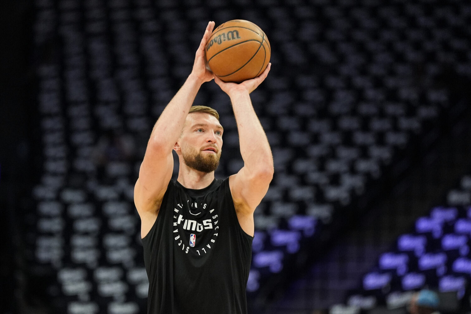 SACRAMENTO, CA - APRIL 13: Domantas Sabonis #11 of the Sacramento Kings warms up before the game ag...