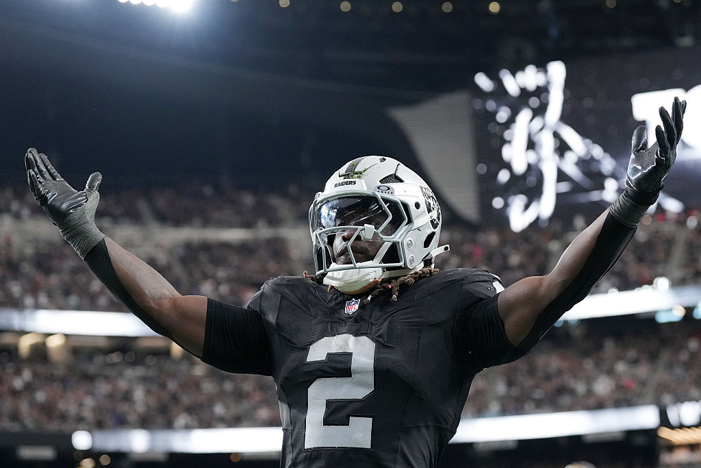 LAS VEGAS, NEVADA - NOVEMBER 02: Ashton Jeanty #2 of the Las Vegas Raiders reacts after scoring a t...