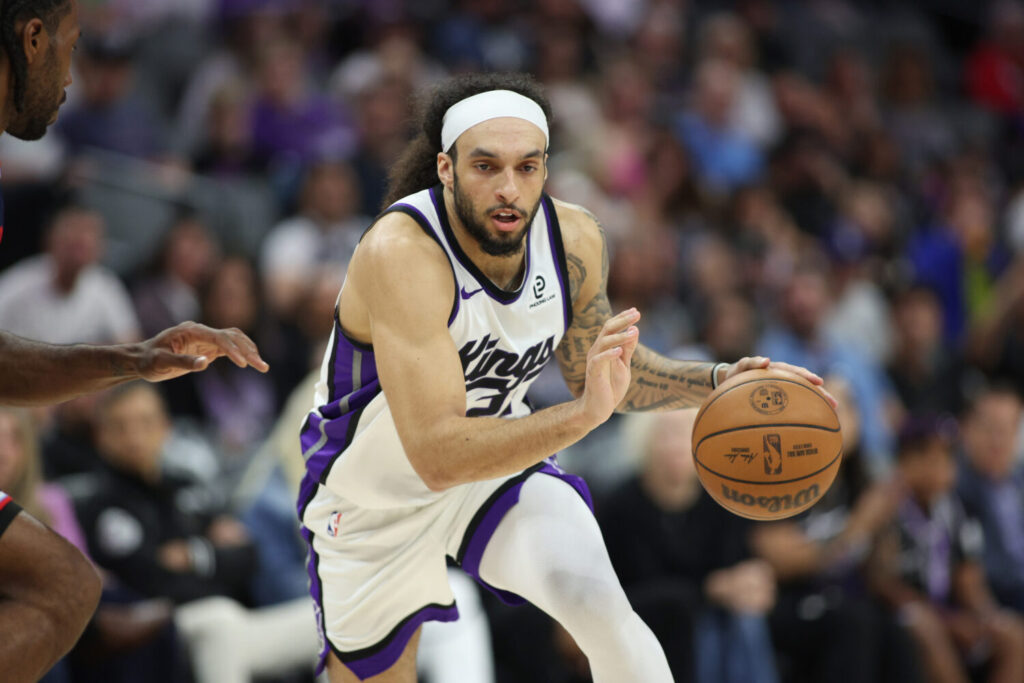 SACRAMENTO, CALIFORNIA - APRIL 05: Devin Carter #22 of the Sacramento Kings handles the ball during the second half against the Los Angeles Clippers at Golden 1 Center on April 05, 2026 in Sacramento, California. NOTE TO USER: User expressly acknowledges and agrees that, by downloading and or using this photograph, User is consenting to the terms and conditions of the Getty Images License Agreement. (Photo by Don Collier/Getty Images)
