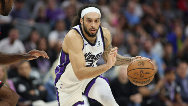 SACRAMENTO, CALIFORNIA - APRIL 05: Devin Carter #22 of the Sacramento Kings handles the ball during the second half against the Los Angeles Clippers at Golden 1 Center on April 05, 2026 in Sacramento, California. NOTE TO USER: User expressly acknowledges and agrees that, by downloading and or using this photograph, User is consenting to the terms and conditions of the Getty Images License Agreement. (Photo by Don Collier/Getty Images)