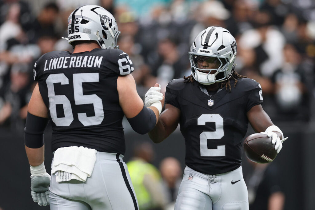 LAS VEGAS, NEVADA - SEPTEMBER 13: Ashton Jeanty #2 of the Las Vegas Raiders greets Tyler Linderbaum #65 during warm ups to the NFL game against the Miami Dolphins at Allegiant Stadium on September 13, 2026 in Las Vegas, Nevada. The Raiders defeated the Dolphins 27-13. (Photo by Christian Petersen/Getty Images)