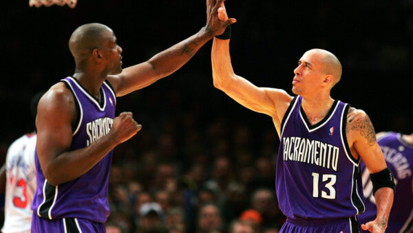 NEW YORK - JANUARY 4: Doug Christie #13 and Chris Webber #4 of the Sacramento Kings high five in the third period of their game against the New York Knicks on January 4, 2005 at Madison Square Garden in New York City. NOTE TO USER: User expressly acknowledges and agrees that, by downloading and or using this photograph, User is consenting to the terms and conditions of the Getty Images License Agreement. (Photo by Ezra Shaw/Getty Images)