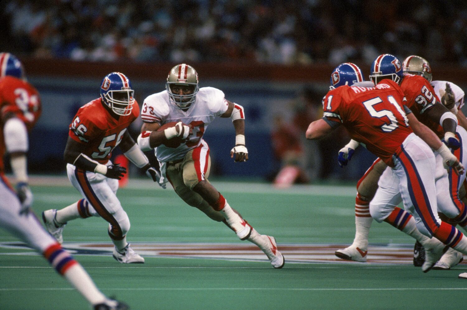 NEW ORLEANS - JANUARY 28: Running back Roger Craig #33 of the San Francisco 49ers looks for room to...