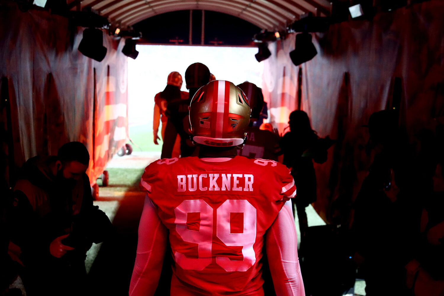 Defensive tackle DeForest Buckner #99 of the San Francisco 49ers walks out the tunnel before the ga...