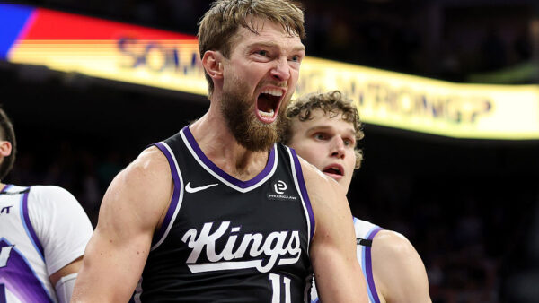 SACRAMENTO, CALIFORNIA - OCTOBER 24: Domantas Sabonis #11 of the Sacramento Kings reacts after he made the game-winning basket against Lauri Markkanen #23 and Walker Kessler #24 of the Utah Jazz at Golden 1 Center on October 24, 2025 in Sacramento, California. NOTE TO USER: User expressly acknowledges and agrees that, by downloading and/or using this photograph, user is consenting to the terms and conditions of the Getty Images License Agreement. (Photo by Ezra Shaw/Getty Images)