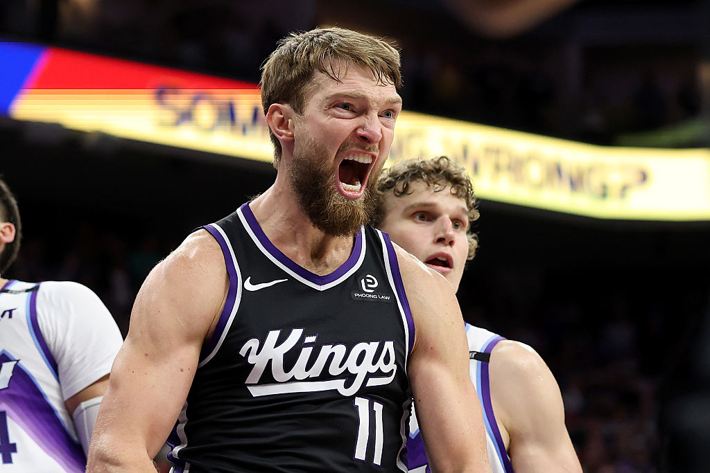 SACRAMENTO, CALIFORNIA - OCTOBER 24: Domantas Sabonis #11 of the Sacramento Kings reacts after he made the game-winning basket against Lauri Markkanen #23 and Walker Kessler #24 of the Utah Jazz at Golden 1 Center on October 24, 2025 in Sacramento, California. NOTE TO USER: User expressly acknowledges and agrees that, by downloading and/or using this photograph, user is consenting to the terms and conditions of the Getty Images License Agreement. (Photo by Ezra Shaw/Getty Images)