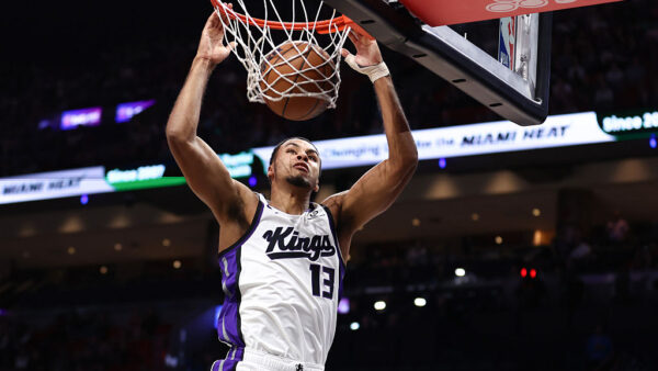 MIAMI, FLORIDA - DECEMBER 06: Keegan Murray #13 of the Sacramento Kings dunks the ball against the Miami Heat during the first quarter of the game at Kaseya Center on December 06, 2025 in Miami, Florida. NOTE TO USER: User expressly acknowledges and agrees that, by downloading and or using this photograph, User is consenting to the terms and conditions of the Getty Images License Agreement. (Photo by Megan Briggs/Getty Images)
