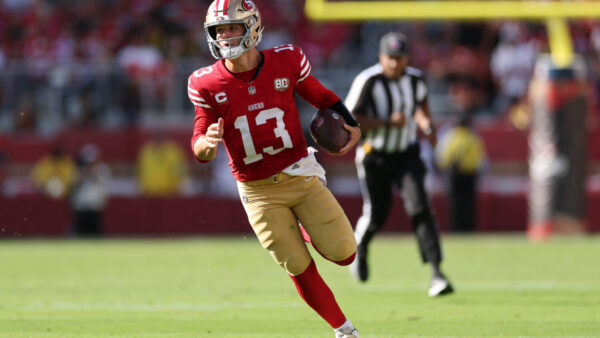 SANTA CLARA, CALIFORNIA - SEPTEMBER 27: Brock Purdy #13 of the San Francisco 49ers runs with the ball during the fourth quarter against the Arizona Cardinals at Levi's Stadium on September 27, 2026 in Santa Clara, California. (Photo by Ezra Shaw/Getty Images)