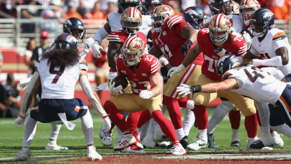 SANTA CLARA, CALIFORNIA - OCTOBER 04: Christian McCaffrey #23 of the San Francisco 49ers runs the ball for a first down in the second quarter against the Denver Broncos at Levi's Stadium on October 04, 2026 in Santa Clara, California. (Photo by Lachlan Cunningham/Getty Images)
