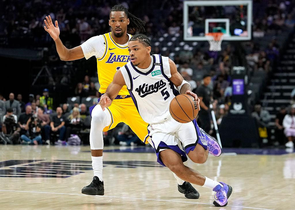 SACRAMENTO, CALIFORNIA - OCTOBER 05: Darius Acuff Jr. #5 of the Sacramento Kings dribbles the ball ...