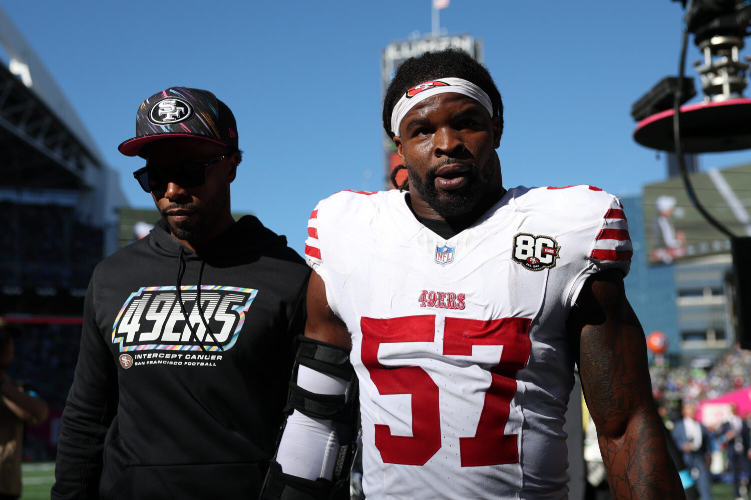 SEATTLE, WASHINGTON - OCTOBER 11: Dre Greenlaw #57 of the San Francisco 49ers leaves the field afte...