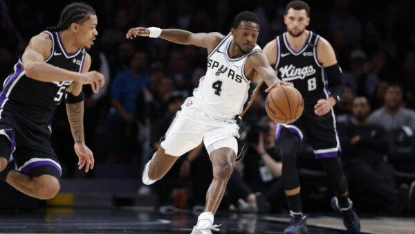 SAN ANTONIO, TX -OCTOBER 16: De'Aaron Fox #4 of the San Antonio Spurs goes for a loose bal against Sacramento Kings in the first half of a preseason game at Frost Bank Center on October 16, 2026 in San Antonio, Texas. NOTE TO USER: User expressly acknowledges and agrees that, by downloading and or using this photograph, User is consenting to terms and conditions of the Getty Images License Agreement. (Photo by Ronald Cortes/Getty Images)