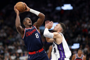 Shorthanded Clippers torch Kings in lackluster season-opener