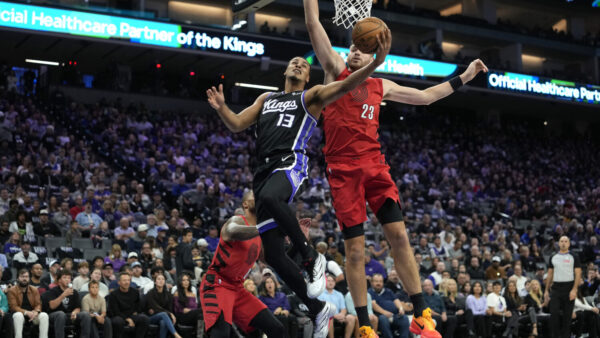 SACRAMENTO, CALIFORNIA - OCTOBER 23: Keegan Murray #13 of the Sacramento Kings shoots and scores over Donovan Clingan #23 of the Portland Trail Blazers in the first half of their game at Golden 1 Center on October 23, 2026 in Sacramento, California. NOTE TO USER: User expressly acknowledges and agrees that, by downloading and or using this photograph, User is consenting to the terms and conditions of the Getty Images License Agreement. (Photo by Thearon W. Henderson/Getty Images)