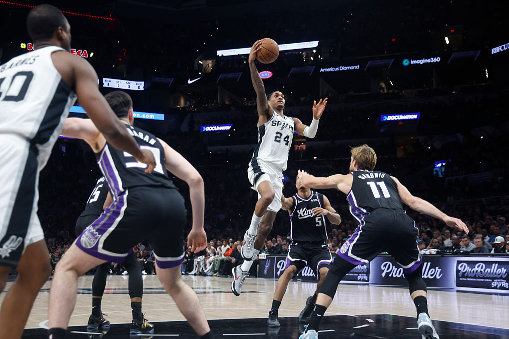 SAN ANTONIO, TX -OCTOBER 27: Devin Vassell #24 of the San Antonio Spurs goes to the basket against Sacramento Kings in the first half at Frost Bank Center on October 27, 2026 in San Antonio, Texas. NOTE TO USER: User expressly acknowledges and agrees that, by downloading and or using this photograph, User is consenting to terms and conditions of the Getty Images License Agreement. (Photo by Ronald Cortes/Getty Images)